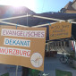2 Plakate mit der Aufschrift "evangelisch-Lutherisches Dekanat W&uuml;rzburg" und "#50JahreFrauenordination in Bayern"